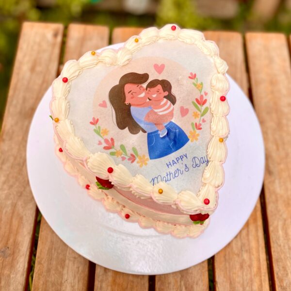 Mini torta Burncake decorada por el Día de la Madre, con centro sorpresa que revela fotos personalizadas.